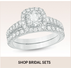 Shop bridal sets with shopping link. Zales engagement ring shows bridal sets and this image is two diamond bands and one main center diamond with diamonds around the main stone.