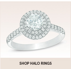 Shop halo rings with shopping link. The image shows a halo ring with two circles of diamonds around the center diamond.