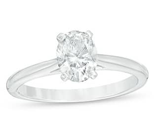 Engagement ring with 14K white gold band shown with an oval diamond setting.