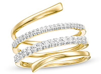 A twisting, yellow gold right hand ring with the two center twists containing rows of diamonds