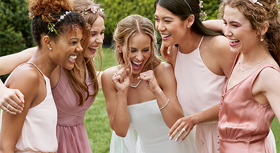 A bride-to-be surrounded by her bridesmaids